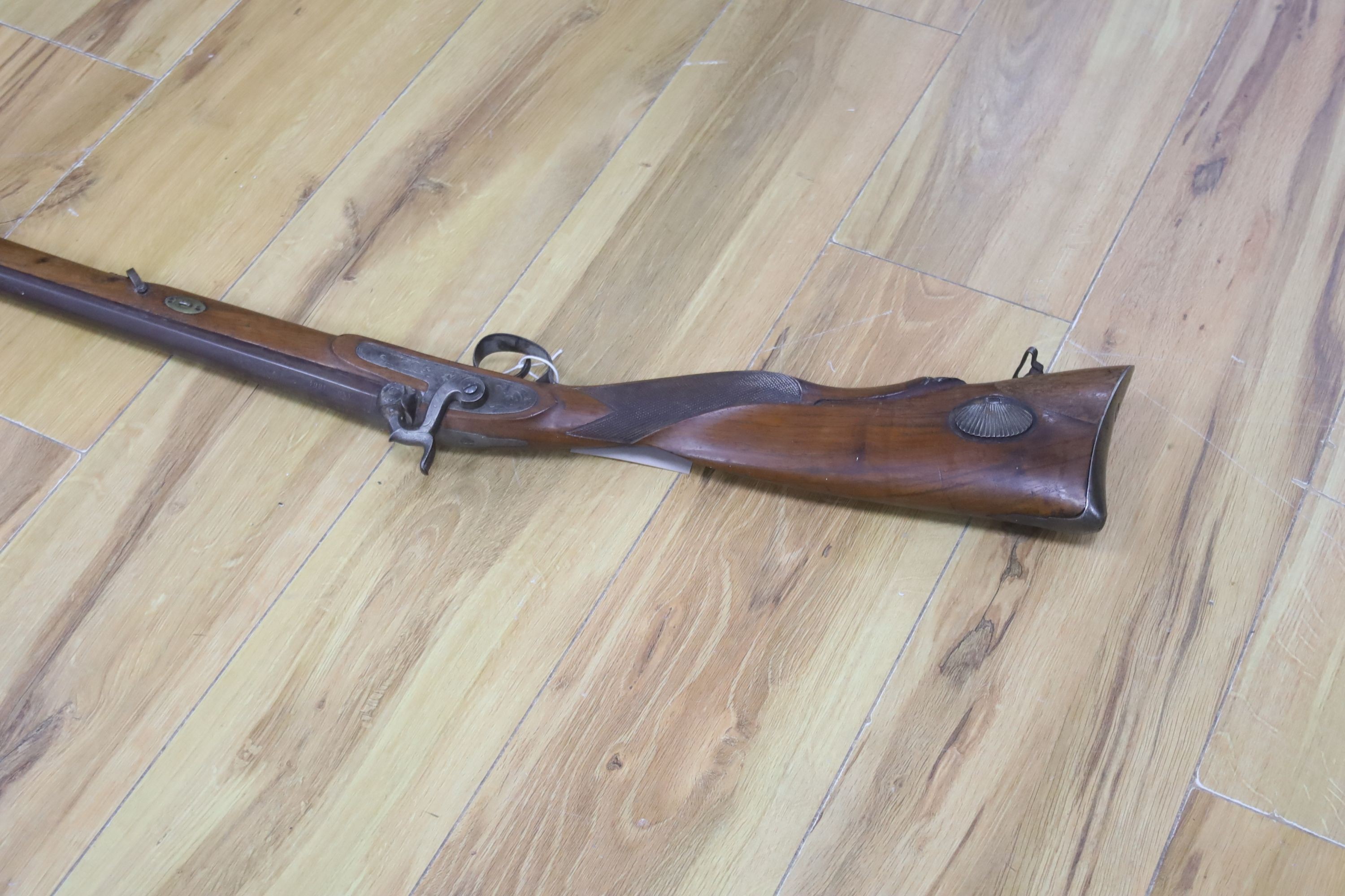 A 19th century percussion musket, barrel impressed Fabricado por Thomas Beristain Eibar, 1864, walnut stock with ramrod, 126cm